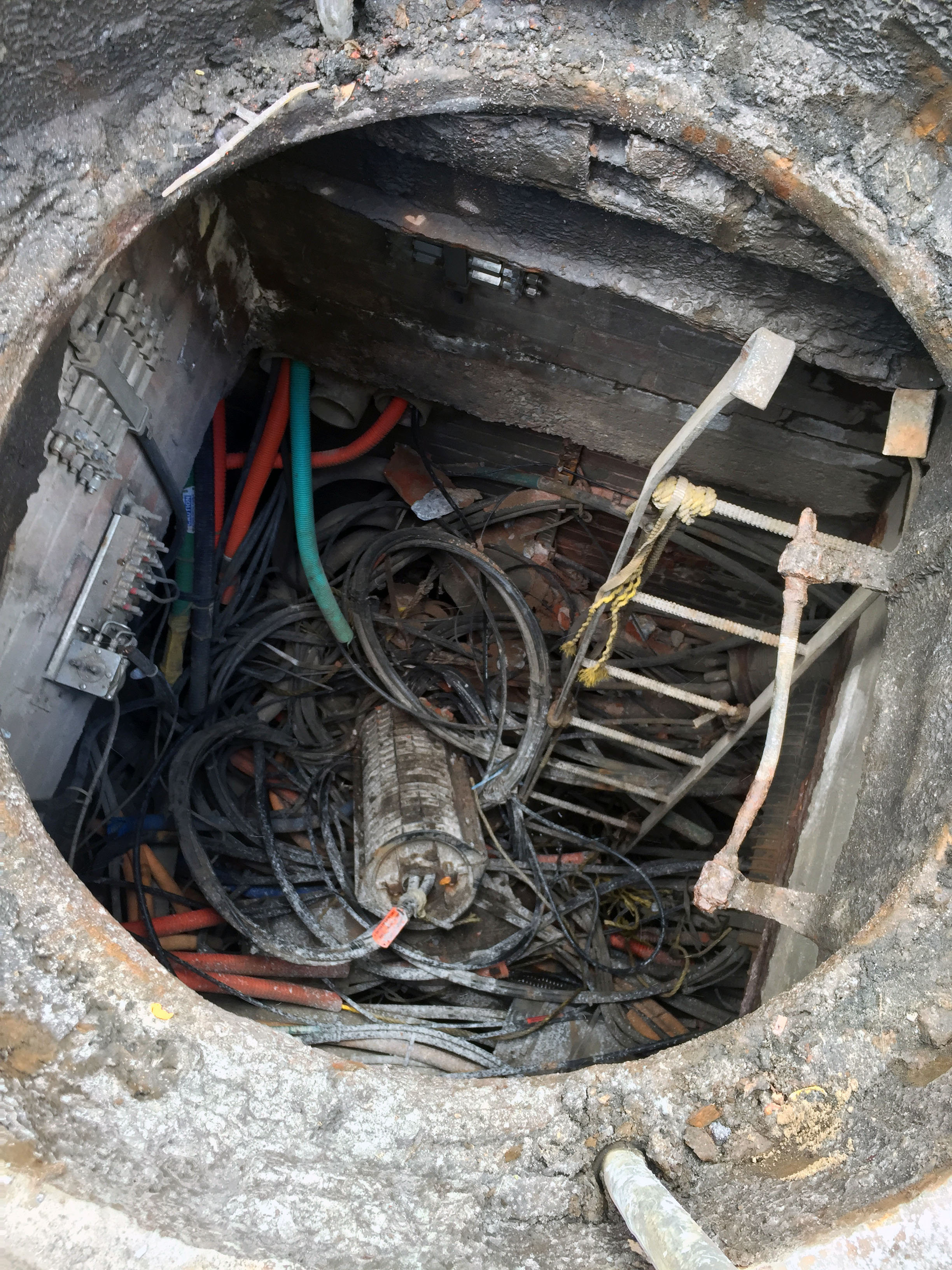 Open manhole with internets exposed